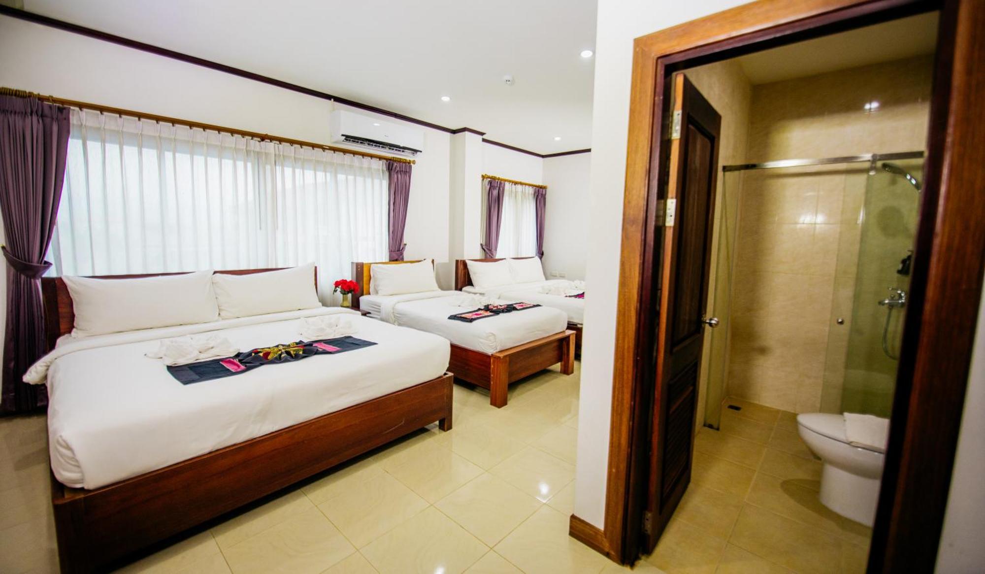 Sisombat Plaza Hotel Vang Vieng Bagian luar foto